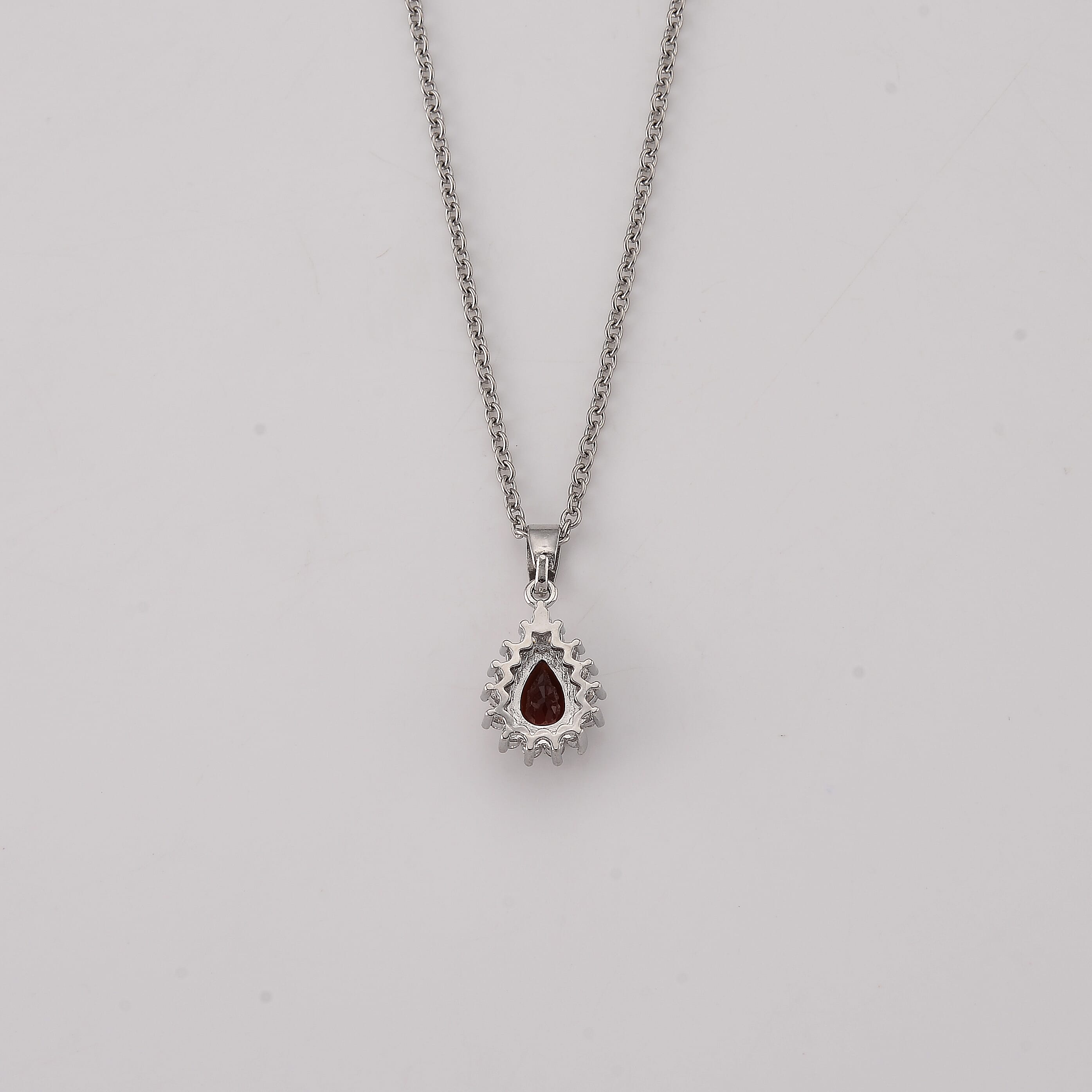 Mozambique Garnet and Simulated Diamond 2.00 ctw Pendant in Silvertone with Stainless Steel Necklace (20 Inches)