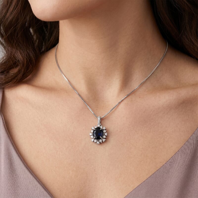 D'Joy Premium Kanchanaburi Blue Sapphire (DF) and Moissanite 8.20 ctw Sunburst Pendant Necklace in Rhodium Over Sterling Silver 18 Inches