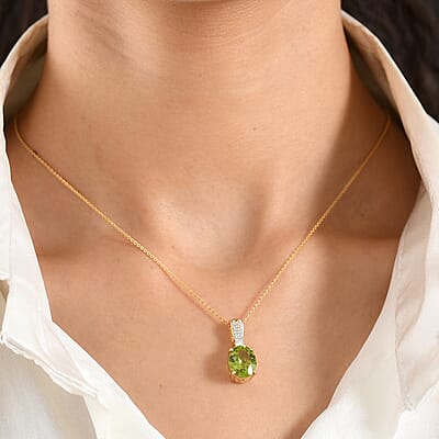 D'Joy AAA Hebei Peridot and Moissanite 3.80 ctw Infinity Bloom Pendant Necklace in 18K Vermeil Yellow Gold Over Sterling Silver 20 Inches