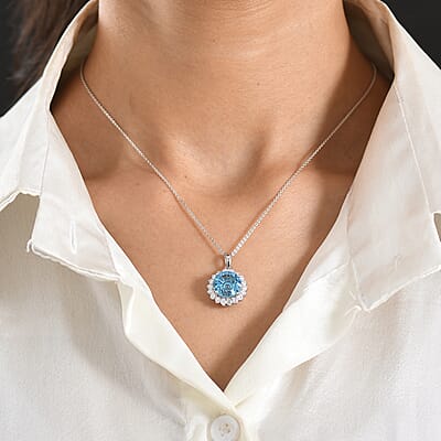 Certified & Appraised D'Joy Crazy Fire Cut Premium Swiss Blue Topaz and Moissanite 6.30 ctw Pendant Necklace in Rhodium Over Sterling Silver 20 Inches