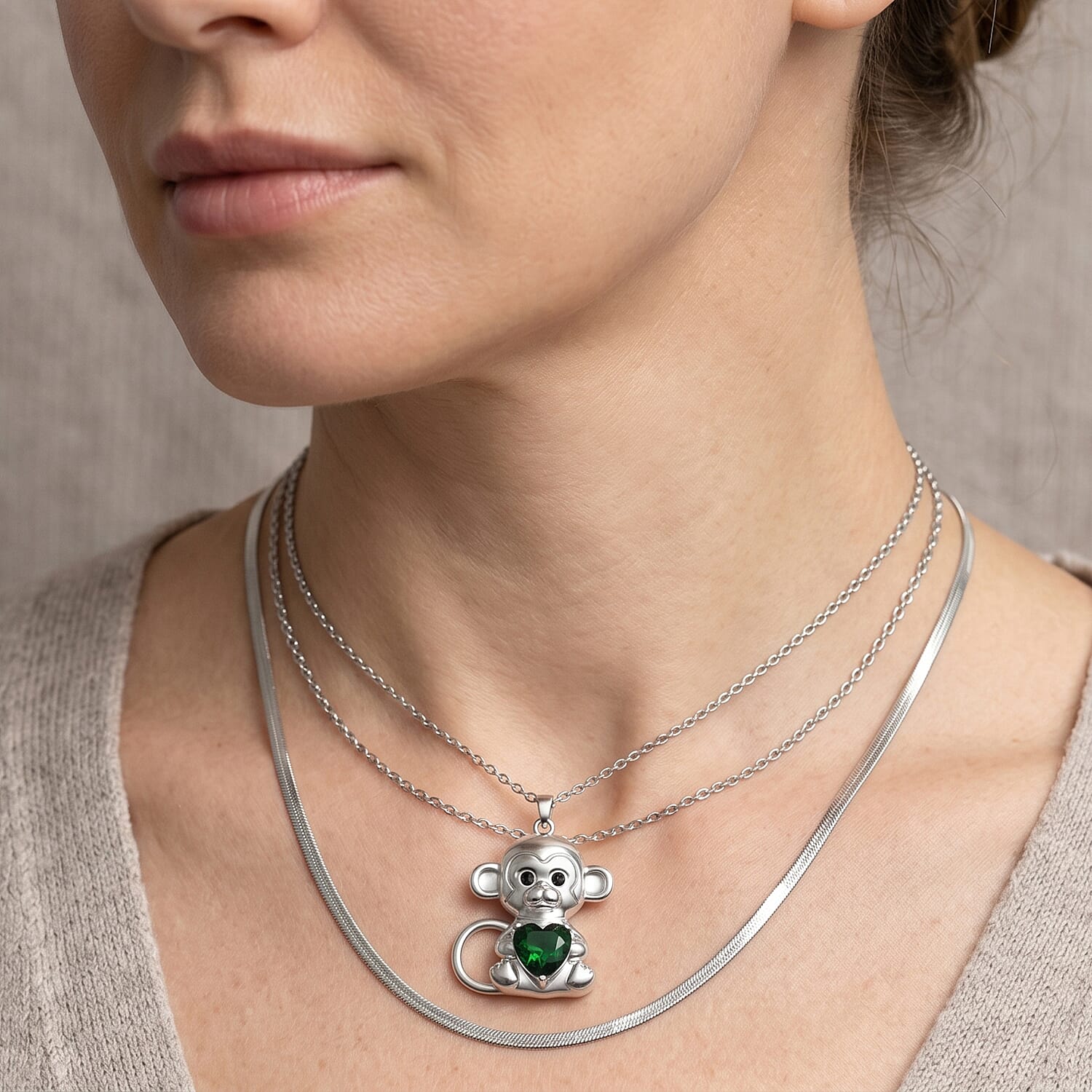 Simulated Emerald, Simulated Black Diamond Monkey Holding Heart Pendant Necklace (20-22 Inches) in Silvertone