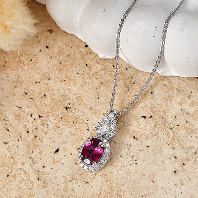 D'Joy Premium Usambara Color Change Garnet and Moissanite 2.07 ctw Pendant Necklace in Rhodium Over Sterling Silver (18 Inches)