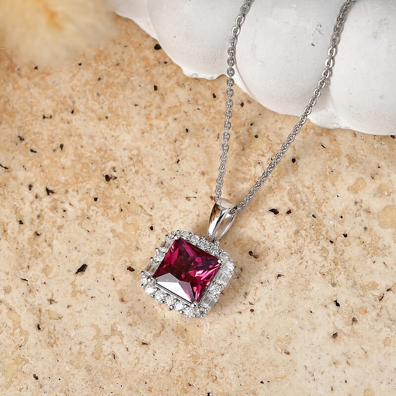 D'Joy Premium Usambara Color Change Garnet and Moissanite 2.30 ctw Pendant Necklace in Rhodium Over Sterling Silver (18 Inches)