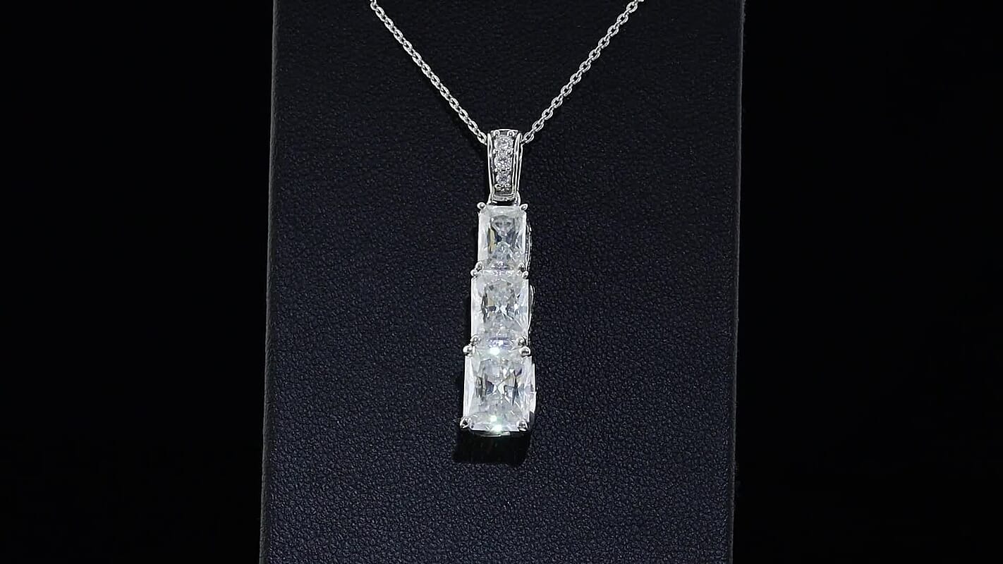 D'Joy Moissanite (Rnd 9mm) Pendant Necklace (20 Inches) in Rhodium Over Sterling Silver 5.15 ctw