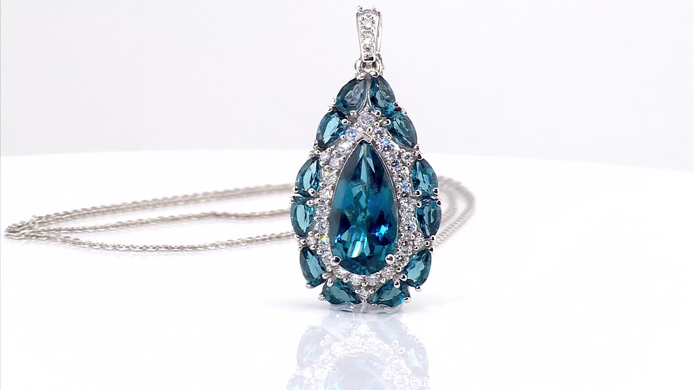 D''Joy London Blue Topaz and Moissanite 8.70 ctw Pendant Necklace in Rhodium Over Sterling Silver 20 Inches