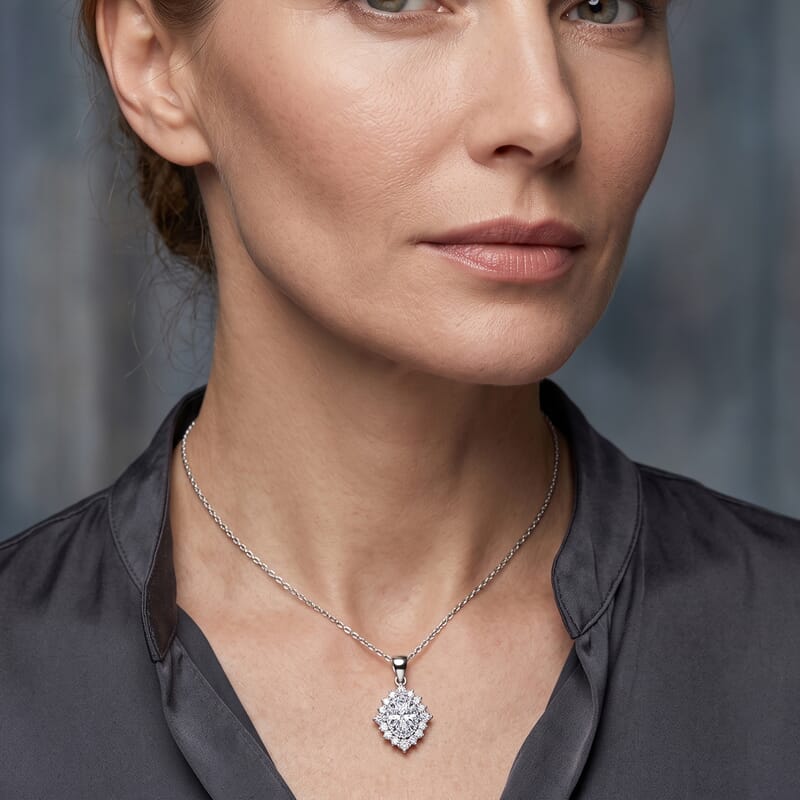 D'Joy Moissanite 2.20 ctw Sunburst Pendant Necklace in Rhodium Over Sterling Silver (18 Inches)