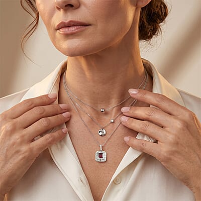 D'Joy Concave Cut Premium Tanzanian Raspberry Garnet and Moissanite 2.15 ctw Pendant Necklace in Rhodium Over Sterling Silver 18 Inches