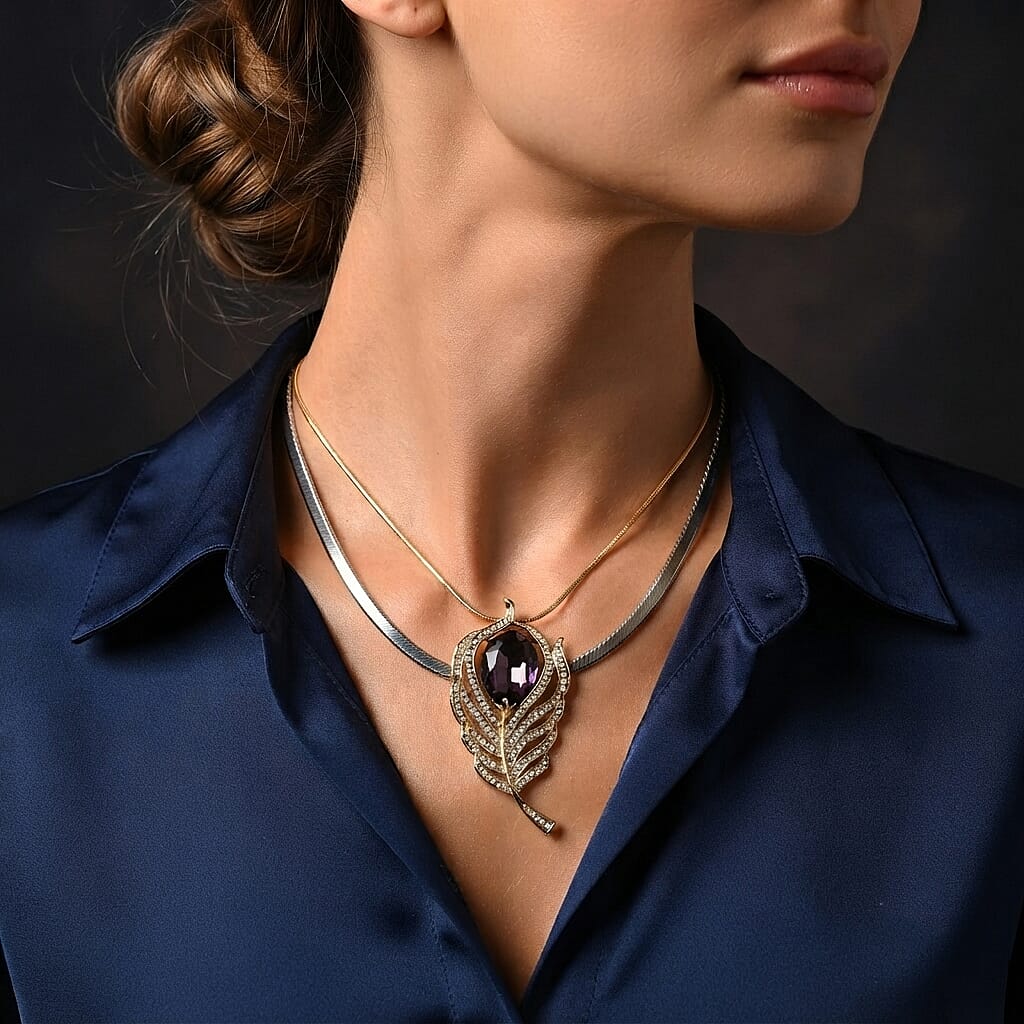 Austrian Crystal and Purple Glass Feather Pendant Necklace (29.50-31.50 Inches) in Goldtone