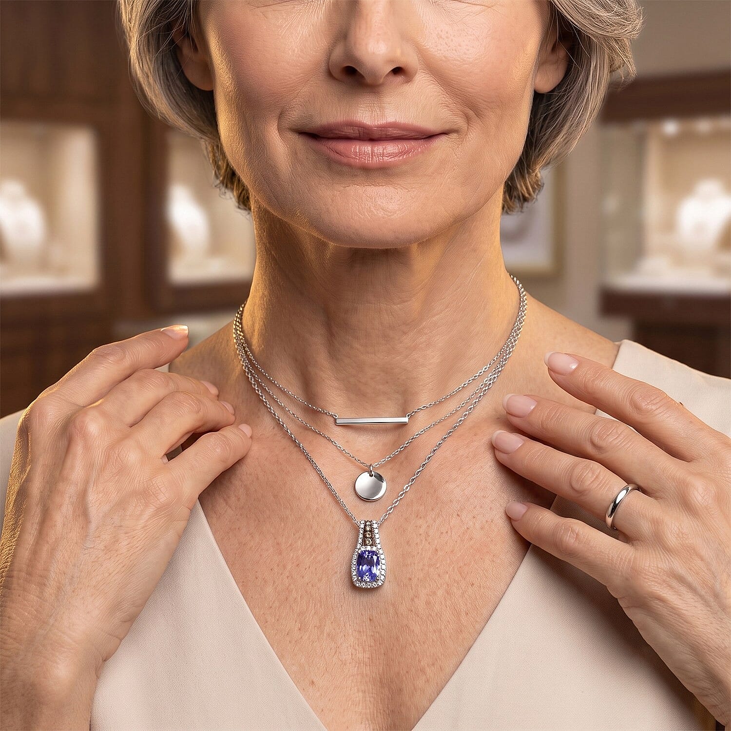 D'Joy Premium Tanzanite, Natural Champagne and White Diamond 1.15 ctw Midnight Royal Halo Pendant Necklace in Rhodium Over Sterling Silver 20 Inches