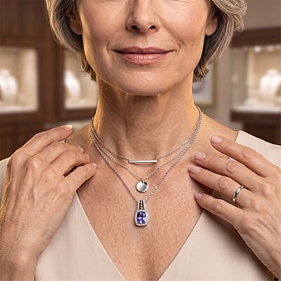 D'Joy Premium Tanzanite, Natural Champagne and White Diamond 1.15 ctw Midnight Royal Halo Pendant Necklace in Rhodium Over Sterling Silver 20 Inches