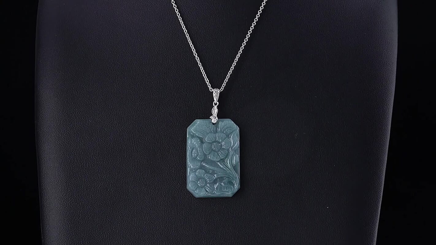 D''Joy Natural Olmec Jadeite and Moissanite 57.70 ctw Carved Floral Pendant in Rhodium Over Sterling Silver with Stainless Steel Necklace 20 Inches
