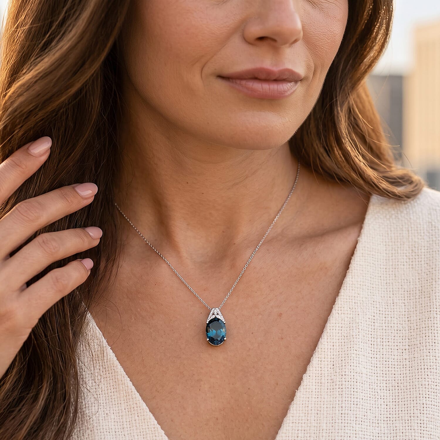 Certified & Appraised D'Joy Premium London Blue Topaz and Moissanite 7.15 ctw Pendant Necklace in Rhodium Over Sterling Silver 20 Inches