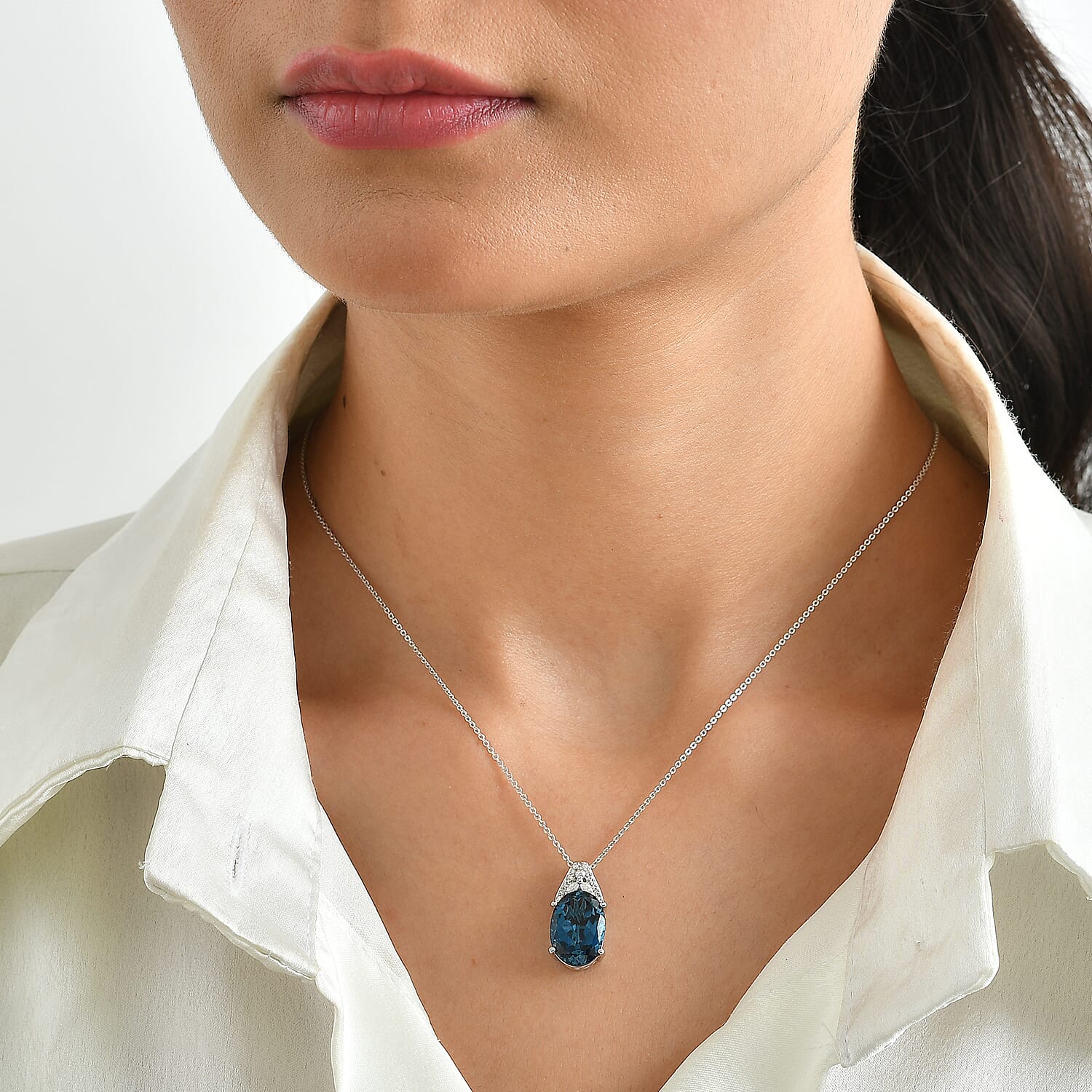 Certified & Appraised D'Joy Premium London Blue Topaz and Moissanite 7.15 ctw Pendant Necklace in Rhodium Over Sterling Silver 20 Inches