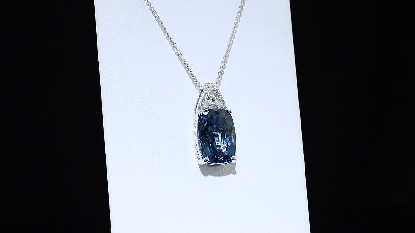 Certified & Appraised D''Joy Premium London Blue Topaz and Moissanite 7.15 ctw Pendant Necklace in Rhodium Over Sterling Silver 20 Inches