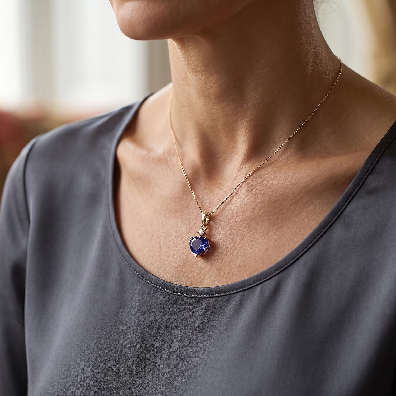 Premium Tanzanite and Diamond (I2) 2.60 ctw Heart Pendant Necklace in 10K Yellow Gold (20 Inches)