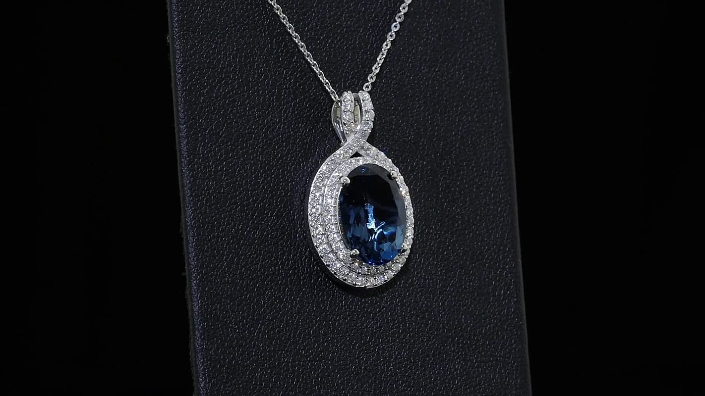D''Joy Premium London Blue Topaz and Moissanite 7.40 ctw Pendant Necklace in Rhodium Over Sterling Silver 20 Inches