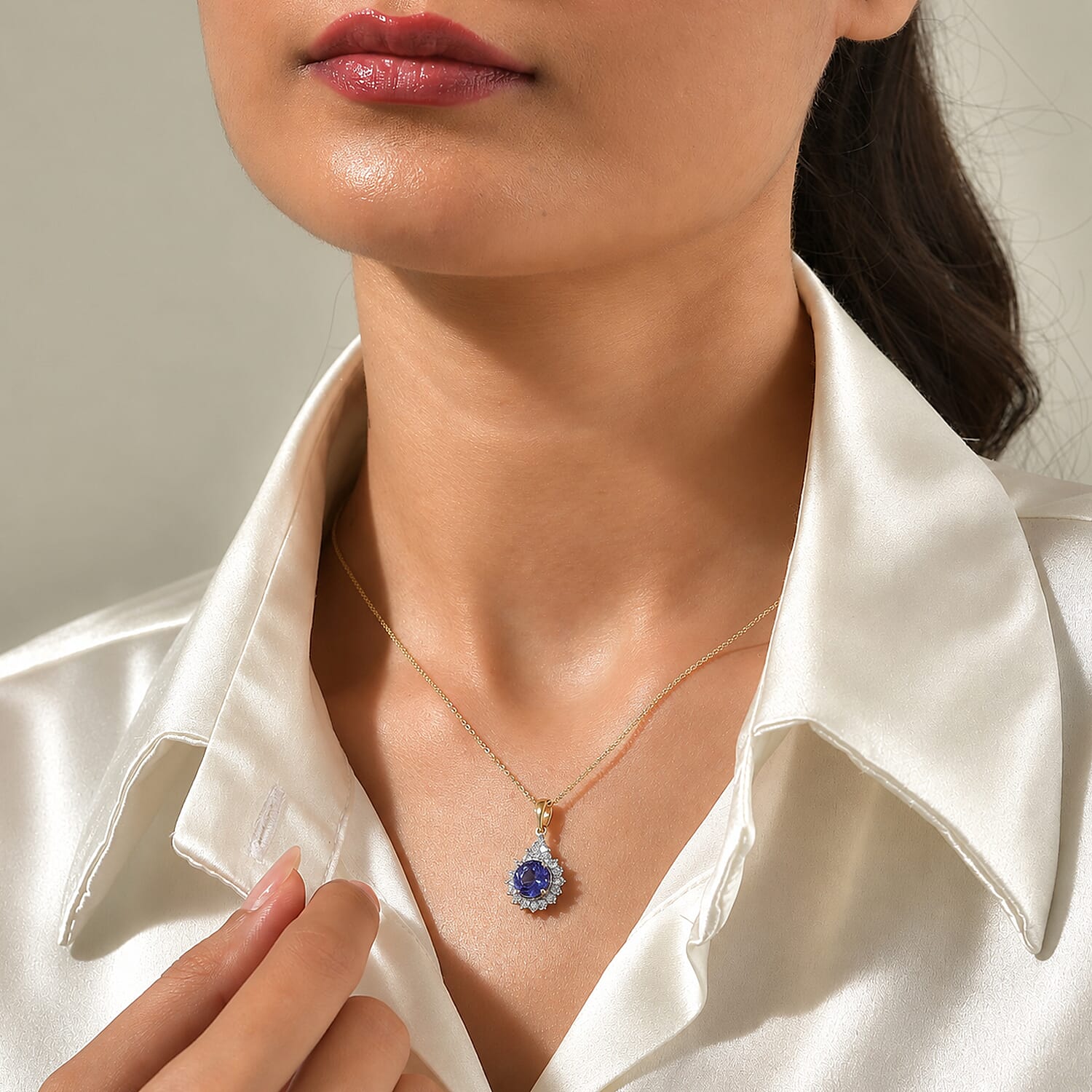 Certified and Appraised AAA Tanzanite and Luxuriant Lab Grown Diamond G-H SI 2.70 ctw Pendant Necklace in 10K Yellow Gold (18 Inches)
