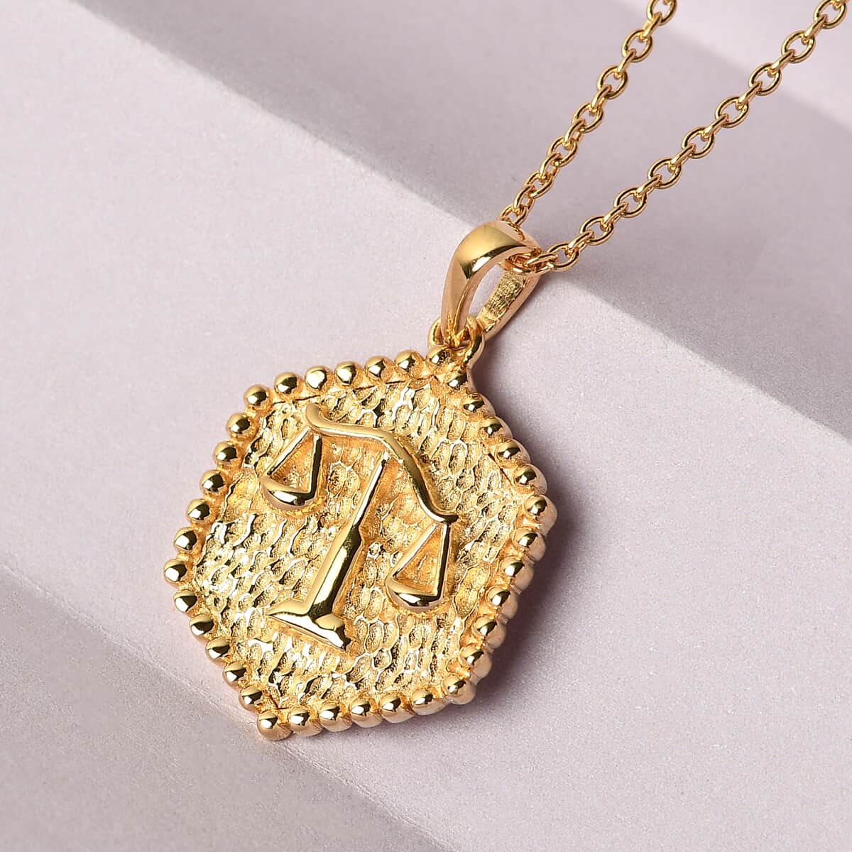 KARIS Libra Zodiac Pendant Necklace 20 Inches in 18K YG Plated and ION Plated Yellow Gold Stainless Steel image number 1