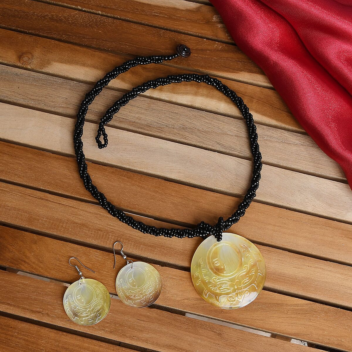 Carved Gray Shell and Seed Beaded Necklace 20 Inches and Dangle Earrings in Stainless Steel image number 1
