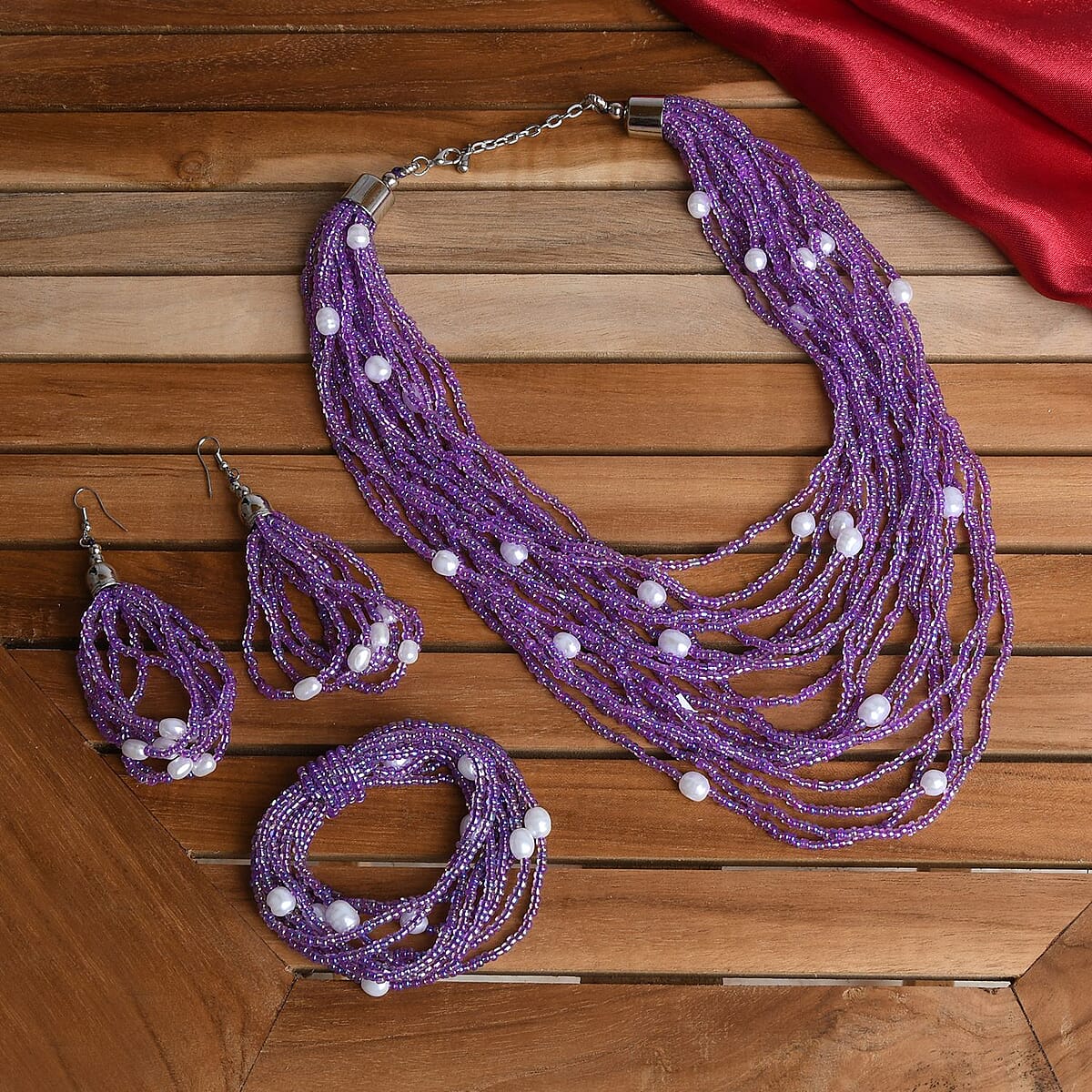 Purple Seed Beaded, Simulated Pearl Multi Layered Necklace (20 Inches) and Dangle Earrings and Stretch Bracelet in Stainless Steel , Tarnish-Free, Waterproof, Sweat Proof Jewelry image number 1
