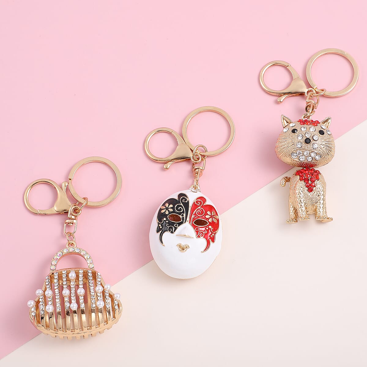 Set of 3pcs Multi Color Austrian Crystal, Enameled Mask, Handbag and Cat Keychain in Goldtone image number 1