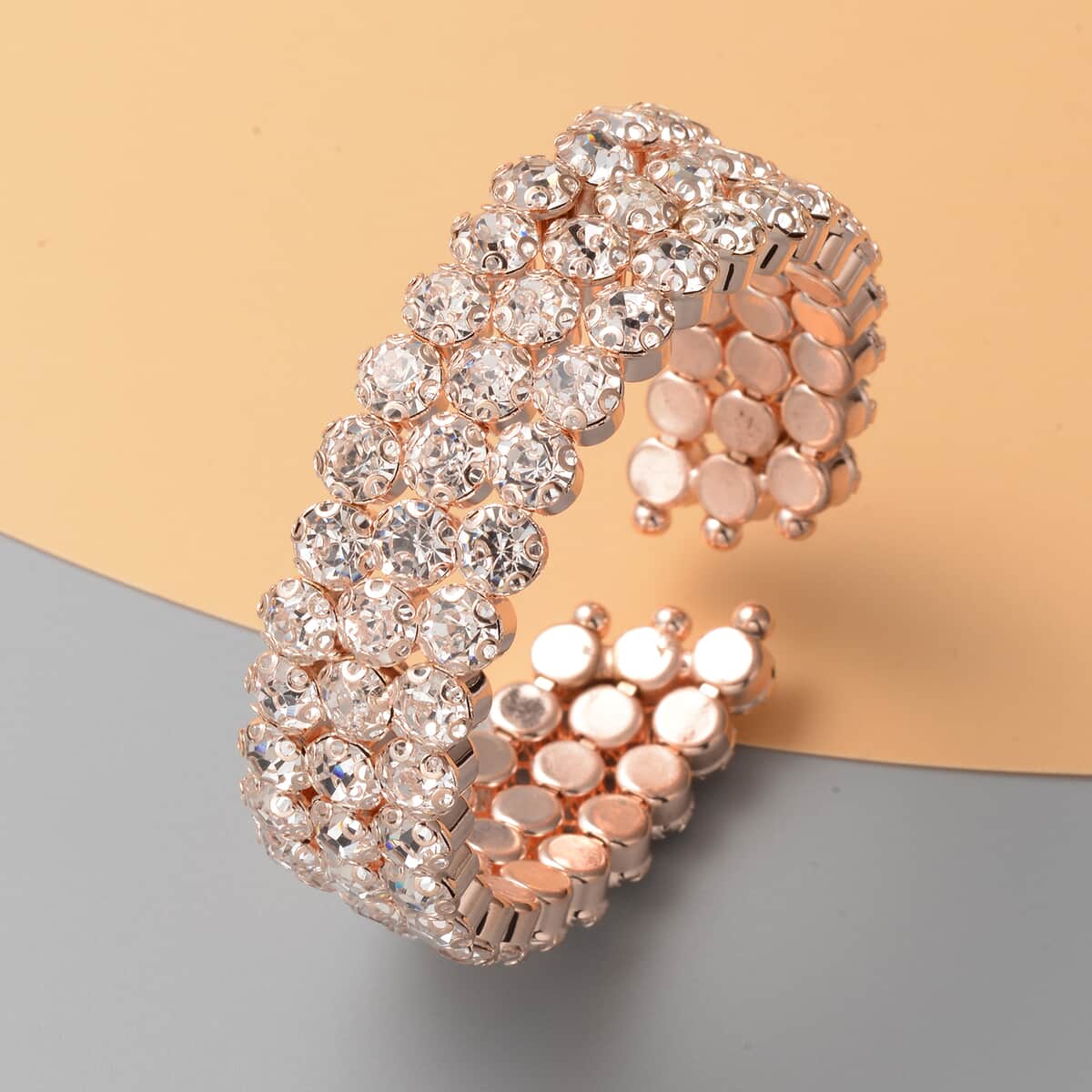 White Austrian Crystal Triple-Row Cuff Bracelet in Rosetone (6.50 In) image number 1