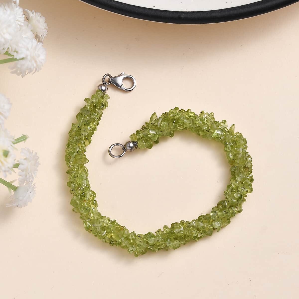 Peridot Chips 3 Strand Bracelet in Platinum Over Sterling Silver (7.25 In) 77.50 ctw image number 1