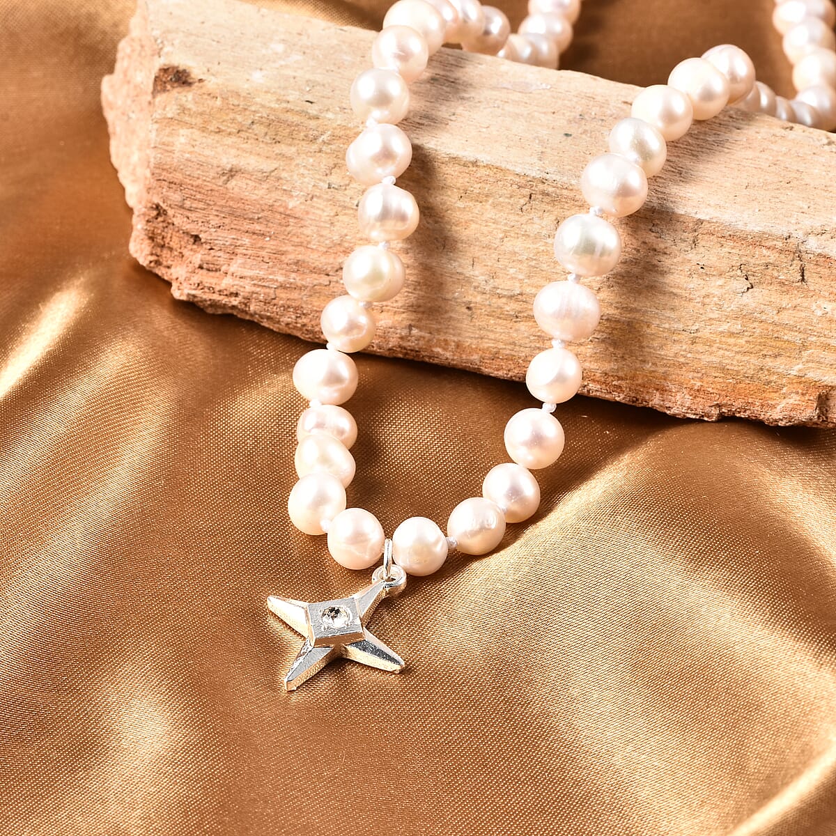 Freshwater White Cultured Pearl 6-8mm and Austrian Crystal Cross Charm Necklace 20 Inches in Silvertone image number 1