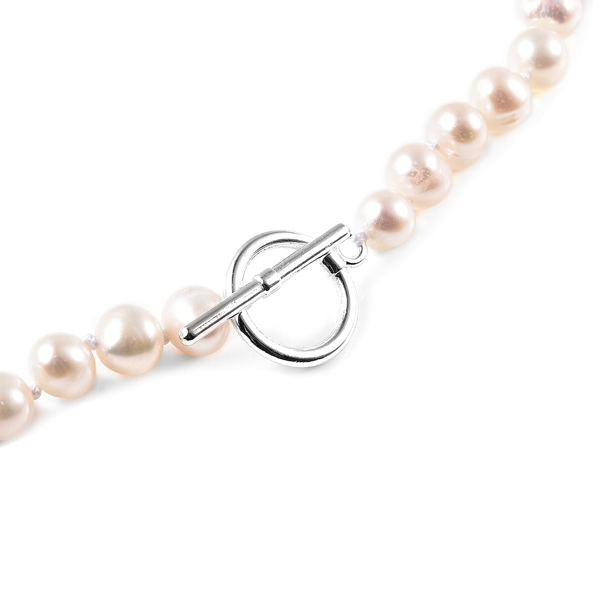 Freshwater White Cultured Pearl 6-8mm and Austrian Crystal Cross Charm Necklace 20 Inches in Silvertone image number 3