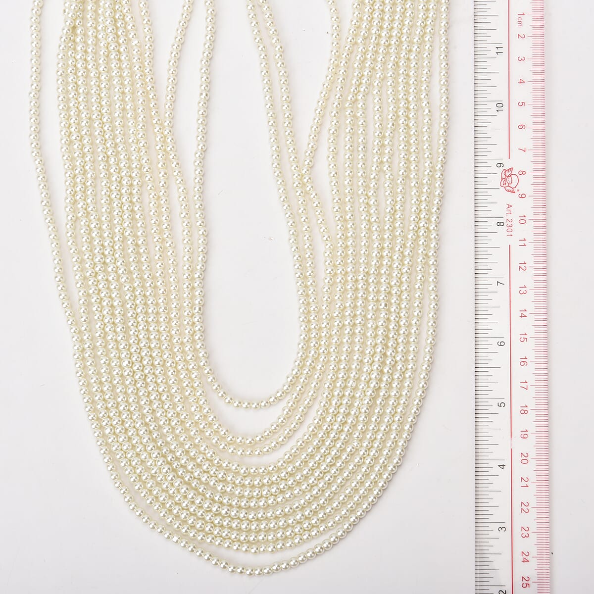 Simulated White Color Pearl Multi Strand Necklace 21-24 Inches in Silvertone image number 4