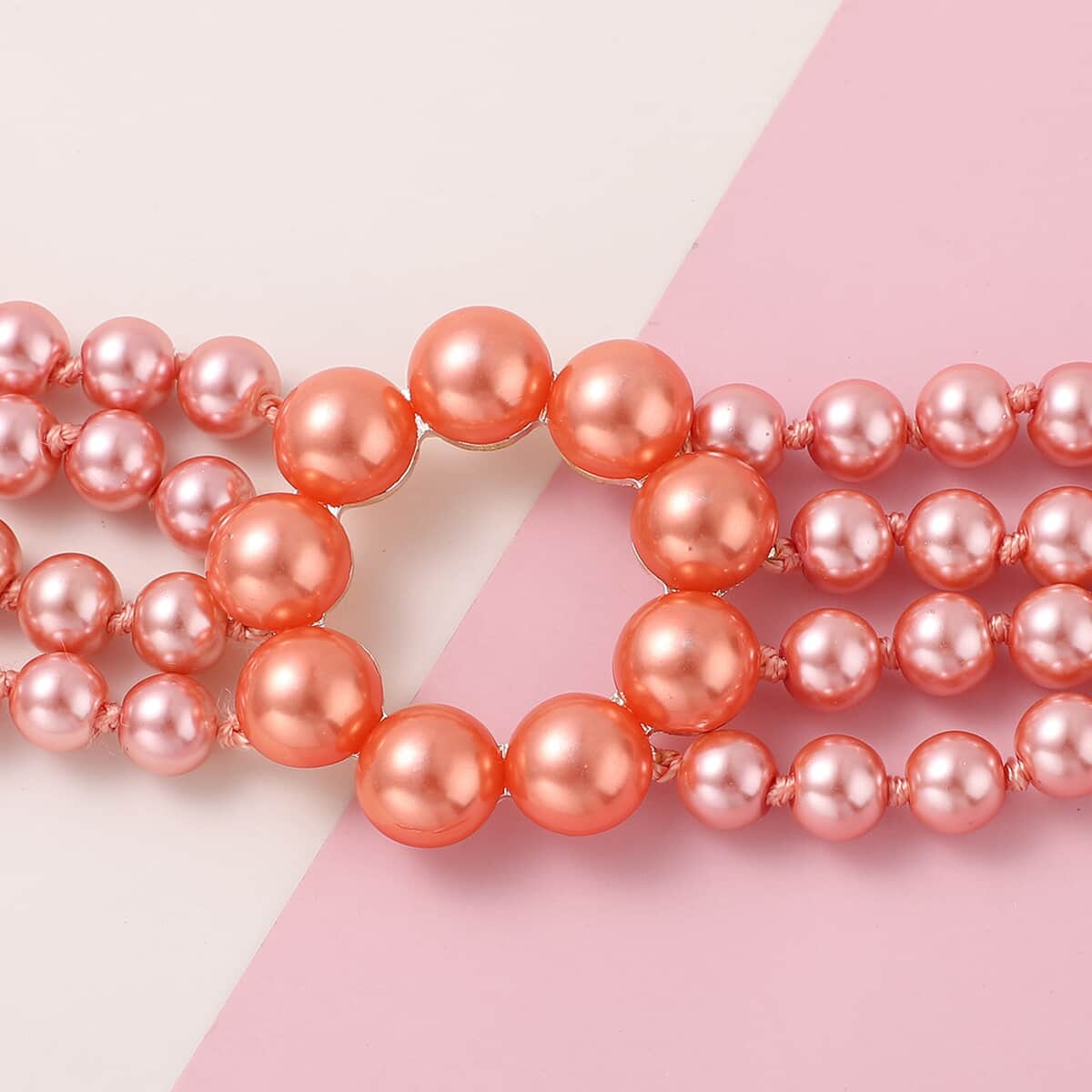 Simulated Peach Pearl Multi Row Necklace 22-24 Inches in Rosetone image number 1