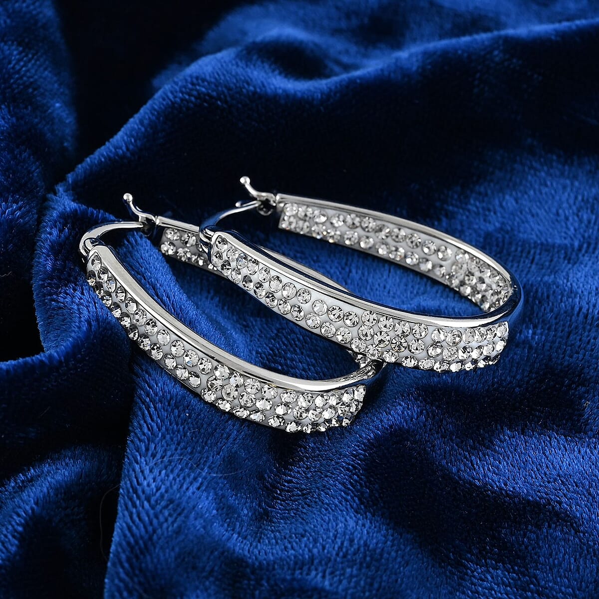 White Austrian Crystal Inside-Out Hoop Earrings in Silvertone image number 1