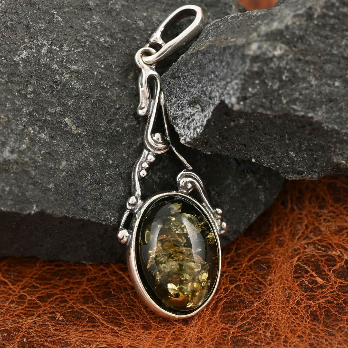 Mayan Green Amber Pendant in Sterling Silver image number 1