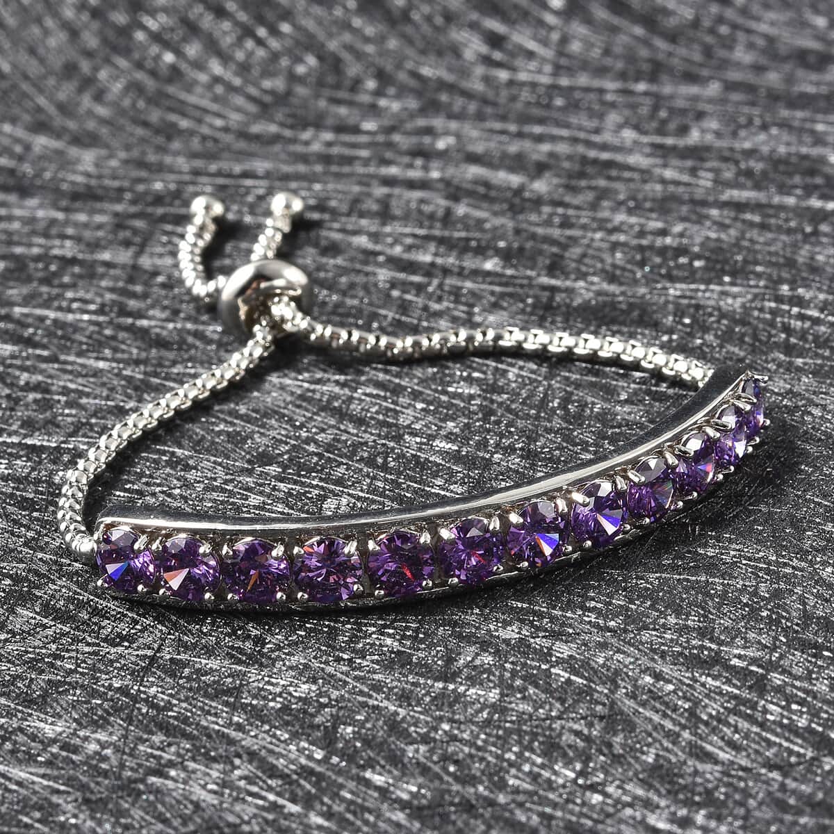 Simulated Amethyst Color Diamond Half Tennis Bolo Bracelet in Silvertone image number 1