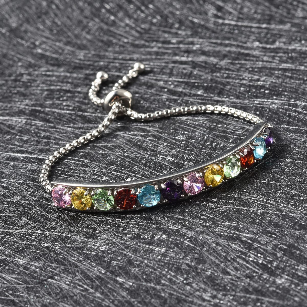 Simulated Multi Color Diamond Half Tennis Bolo Bracelet in Silvertone image number 1