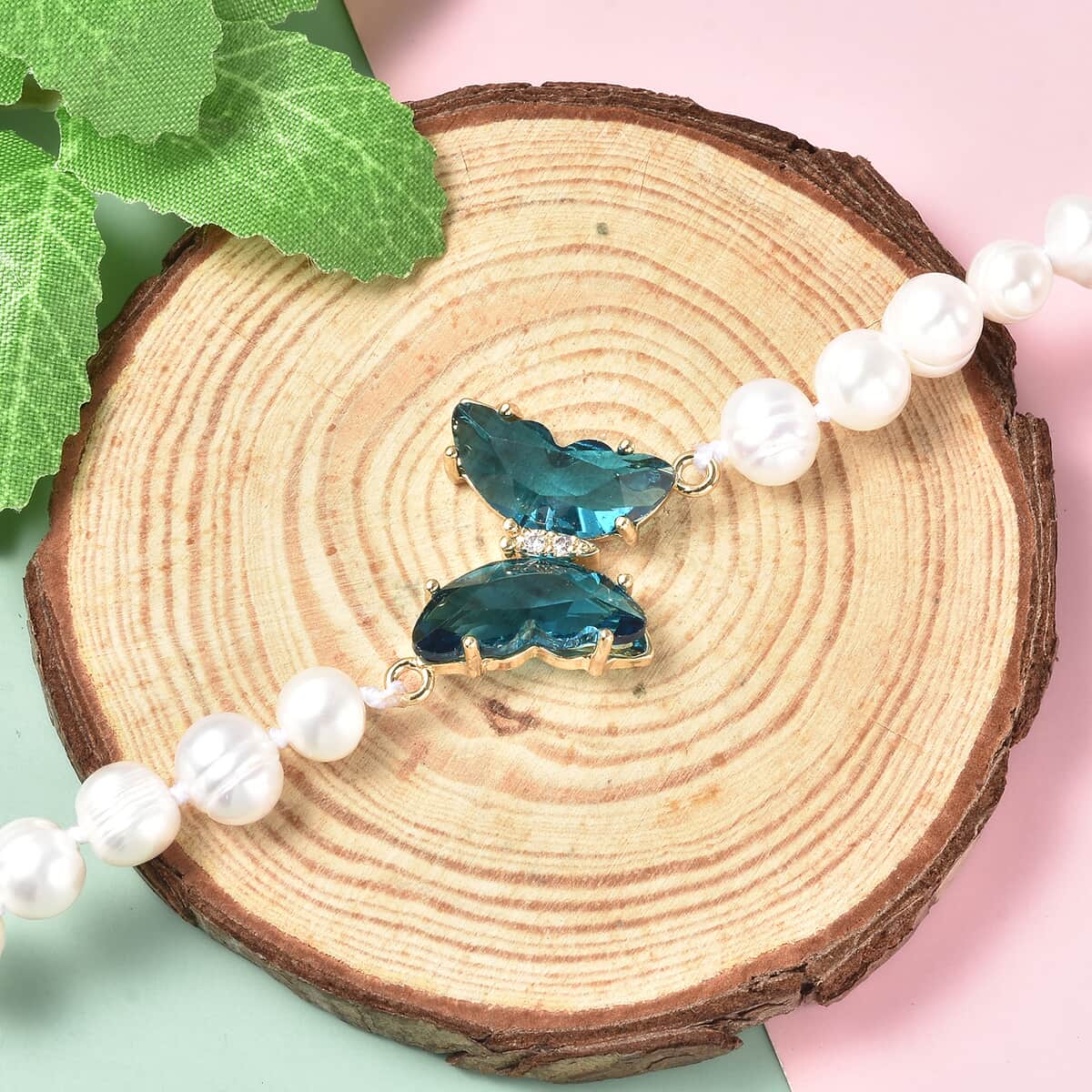 White Freshwater Cultured Pearl, Blue Glass and Austrian Crystal Butterfly Bracelet in Goldtone (7.50 In) image number 1