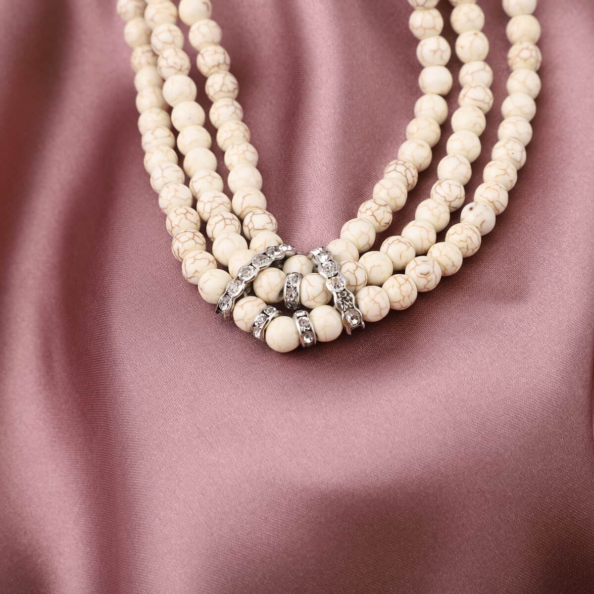 Freshened White Howlite and White Austrian Crystal Triple Row Beaded Necklace 18 Inches in Silvertone 256.50 ctw image number 1