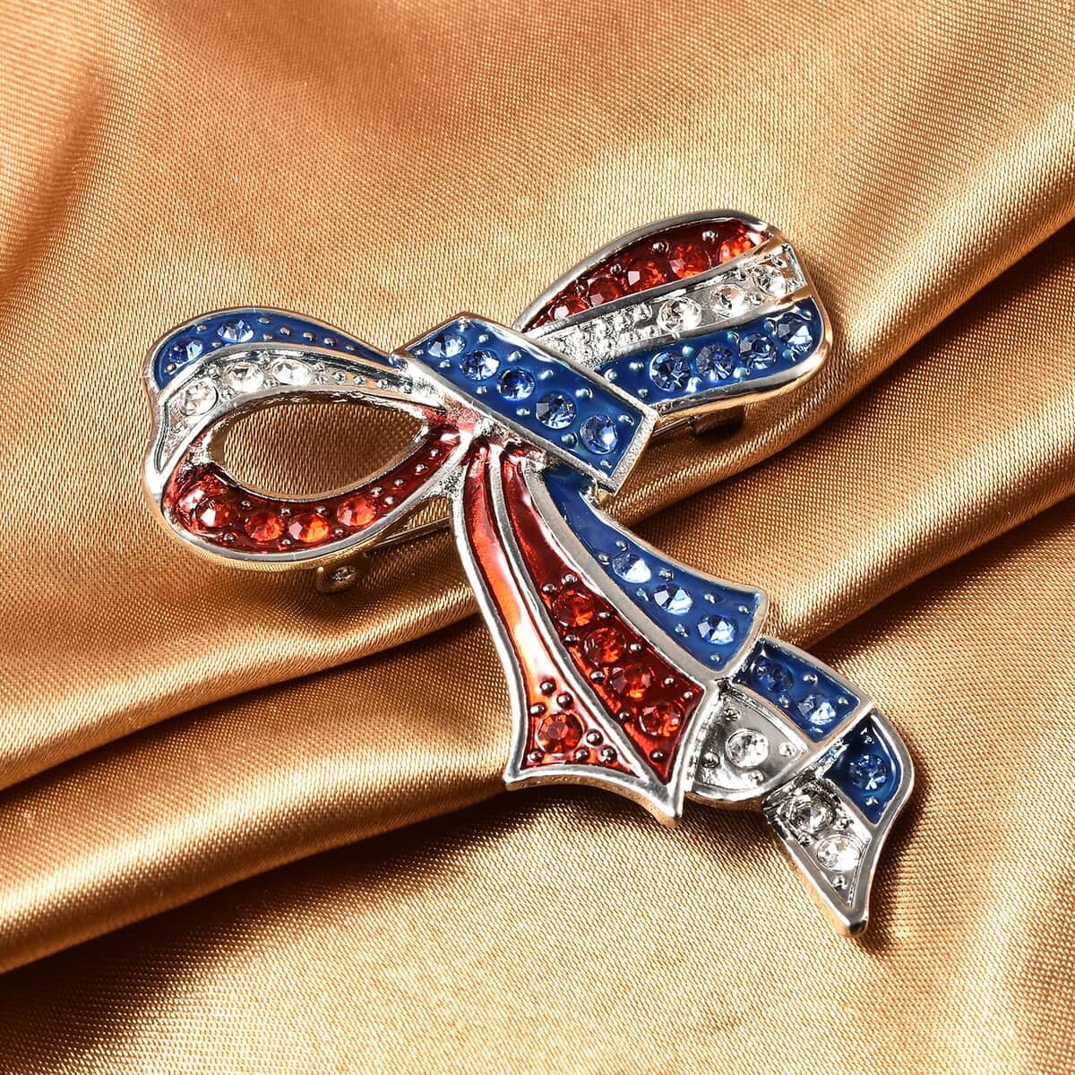 Multi Color Austrian Crystal and Enameled American Flag Ribbon Brooch in Silvertone image number 1
