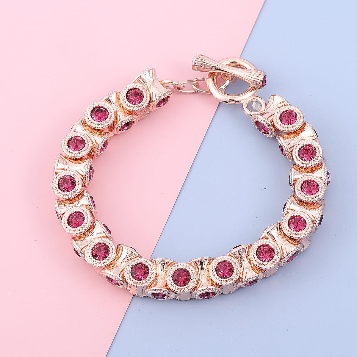 Fuchsia Color Austrian Crystal Bracelet in Rosetone (7.50 In) image number 1