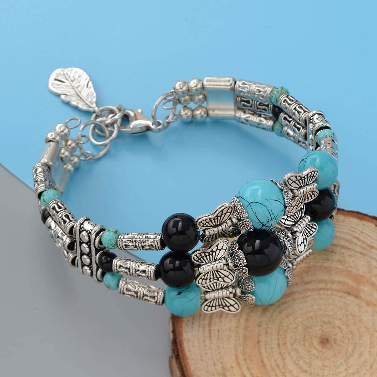 Simulated Blue and Black Sapphire Beaded Bangle Bracelet in Silvertone (7.50 in) image number 1