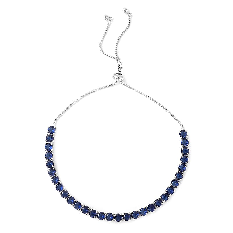 Simulated Blue Diamond Bolo Bracelet in Silvertone