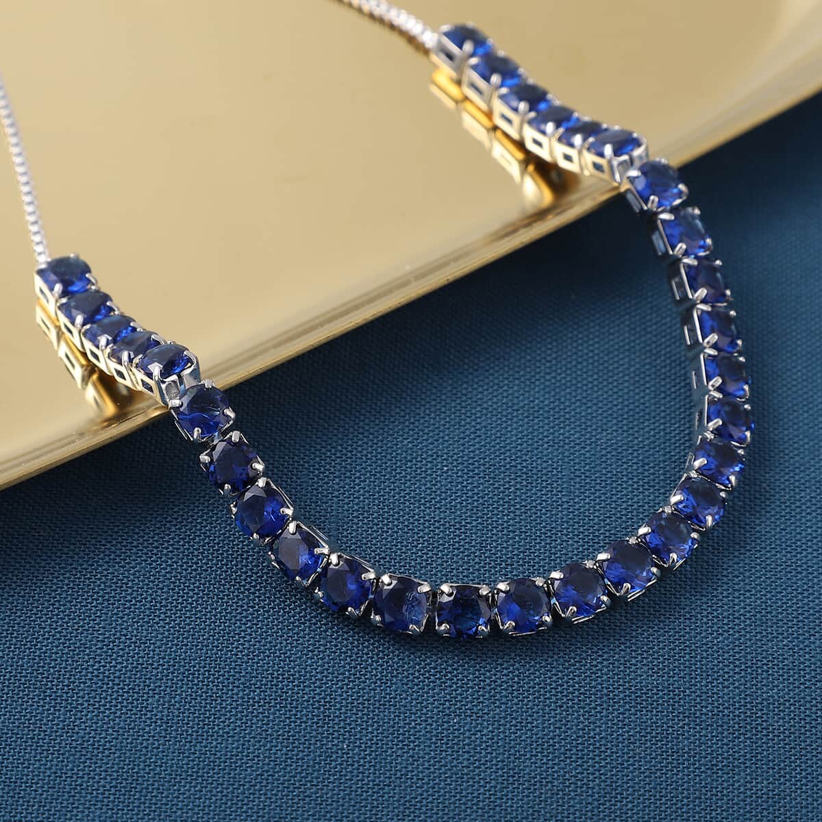 Simulated Blue Diamond Bolo Bracelet in Silvertone image number 1