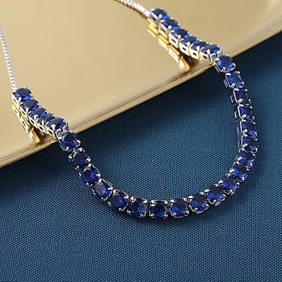 Simulated Blue Diamond Bolo Bracelet in Silvertone
