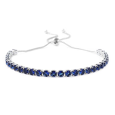 Simulated Blue Diamond Bolo Bracelet in Silvertone