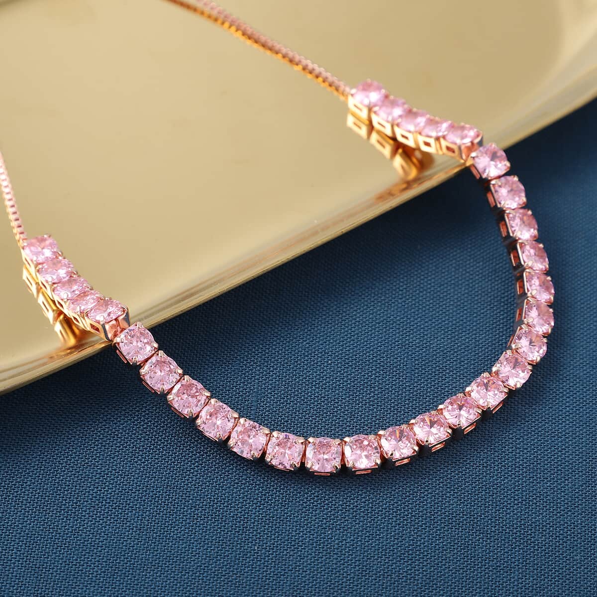 Simulated Pink Diamond Bolo Bracelet in Rosetone image number 1