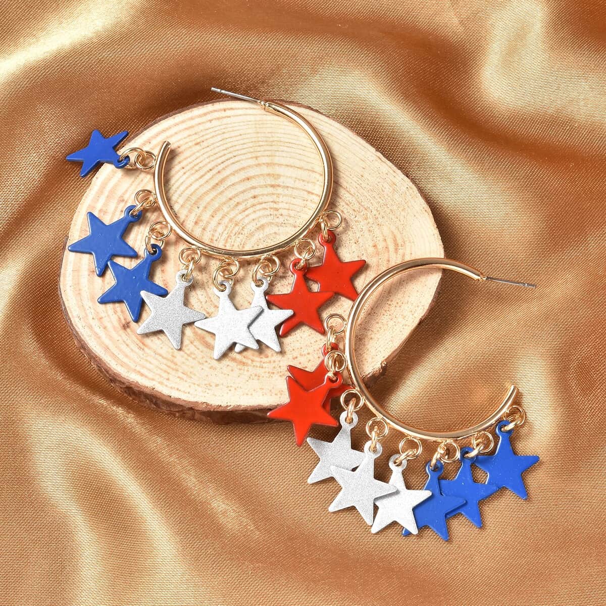 Enameled Stylish Half Hoop Earrings with Tri-color Star Charms in Goldtone image number 1