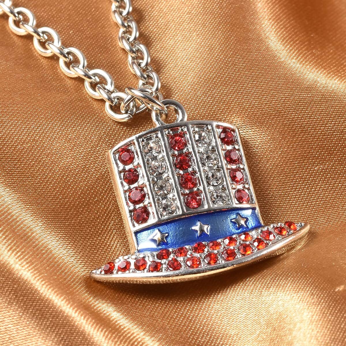 White and Red Austrian Crystal, Enameled Uncle Sam Hat Design Pendant Necklace 23.50-25.50 Inches in Silvertone image number 1