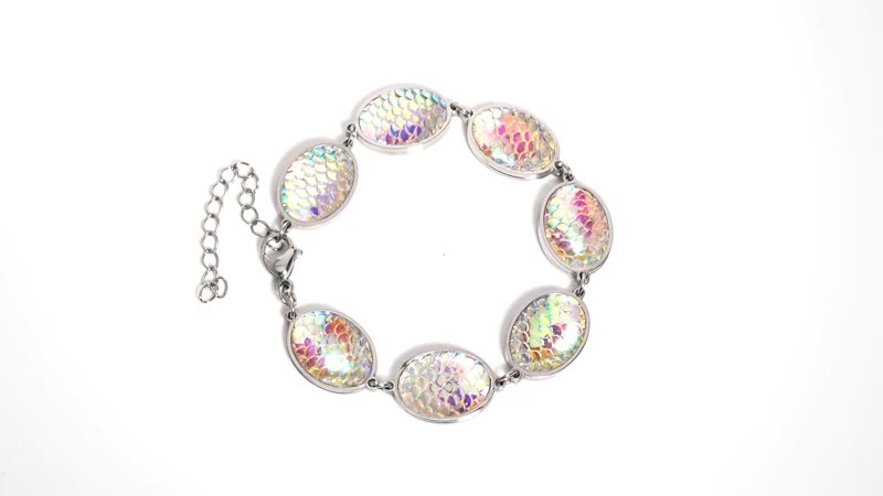 Simulated Blue Magic Color Topaz Disco Ball Theme Oval Charm Station Bracelet in Stainless Steel (7.50 In)