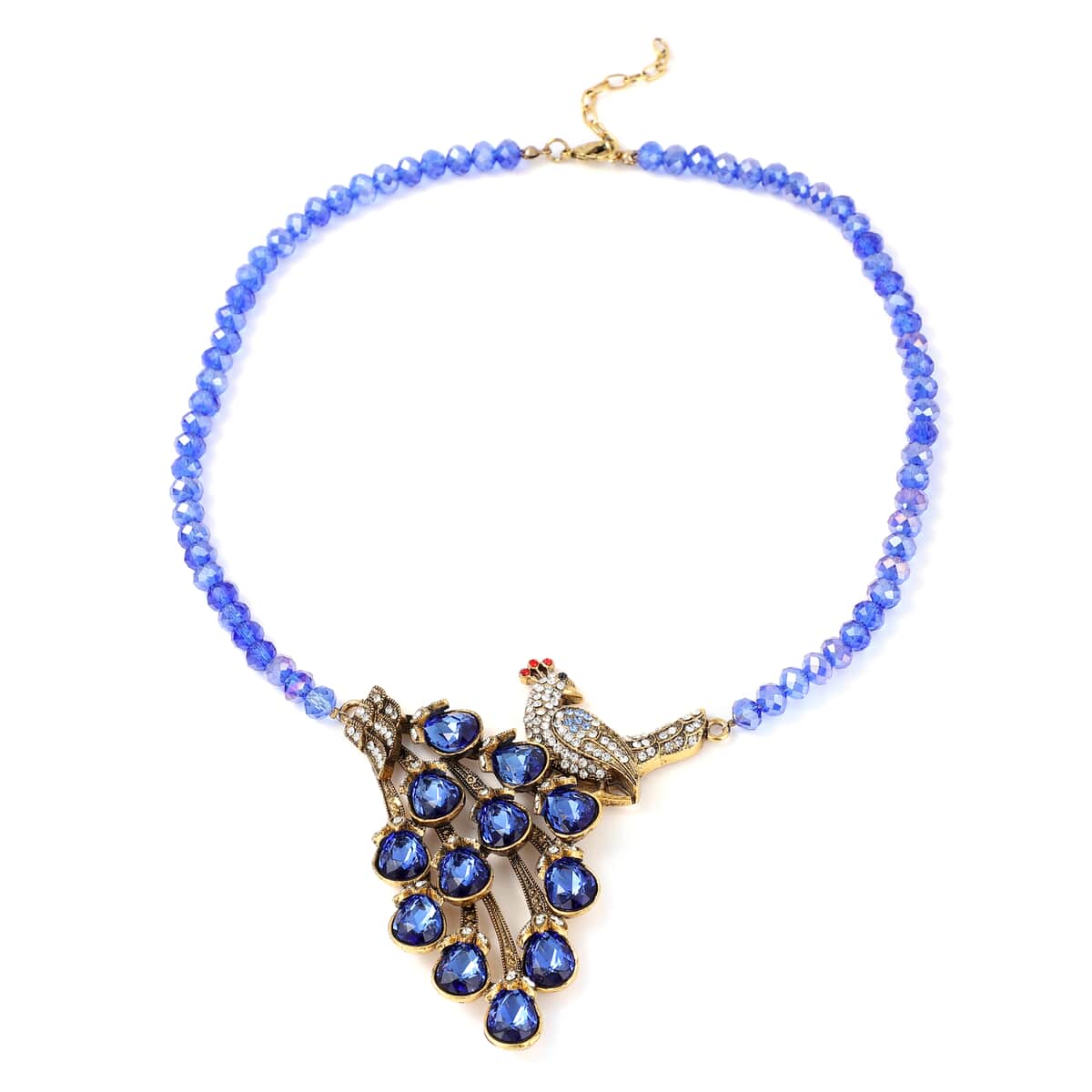 Simulated Blue Magic Color Topa and Blue Austrian Crystal Peacock Necklace 21 Inches in Goldtone image number 0