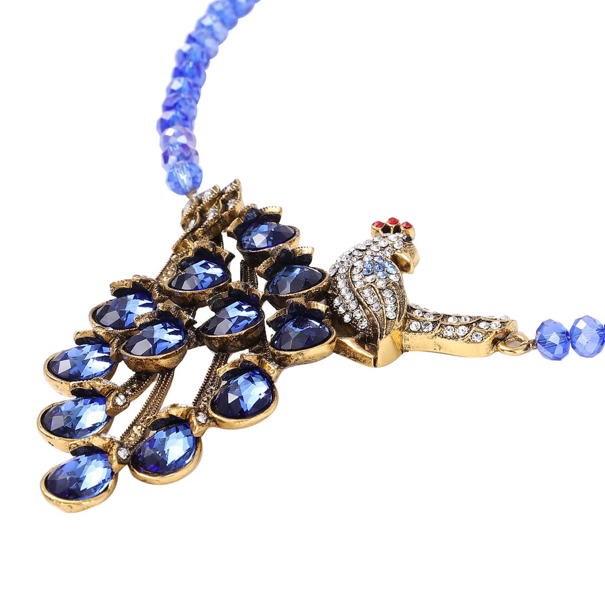 Simulated Blue Magic Color Topa and Blue Austrian Crystal Peacock Necklace 21 Inches in Goldtone image number 3